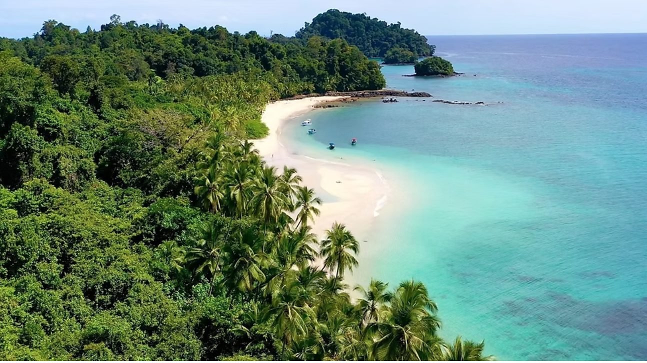 White-sand beach and turquoise water inside Coiba National Park